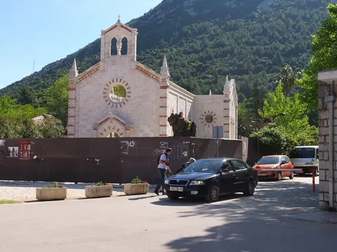 Church and mountains in Ston, Croatia